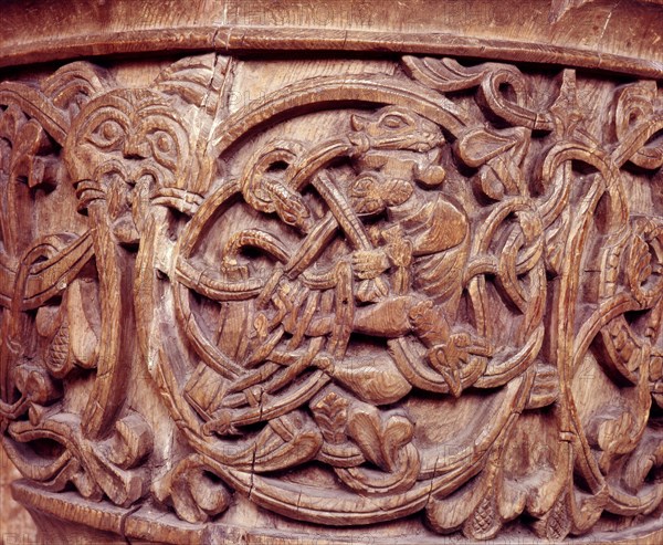 Carving on a baptismal font