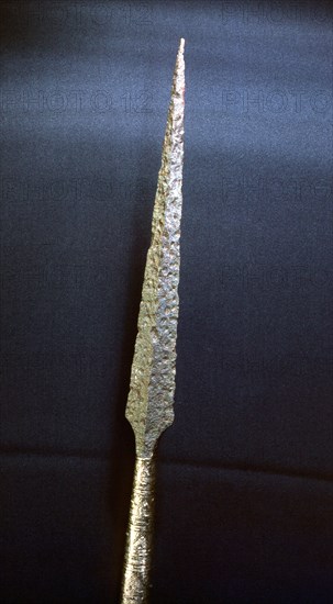 Bronze spear with a decorated silver hilt