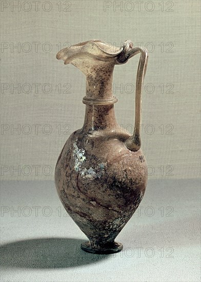 Glass vase with elaborate spout