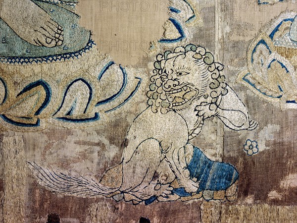 Detail of an embroidered silk banner of the Buddha Sakyamuni preaching on Vulture Peak