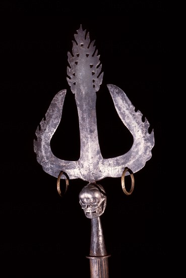 Iron trident with silver skull at base