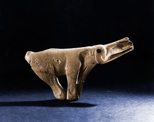 Sculpture of a mammoth from reindeer antler