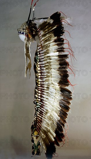 The Sioux shaved horn war bonnet and eagle feather trailer symbolized the collective deeds of the followers of a particular war leader