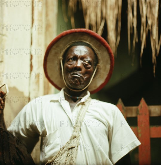 The Akairo-Mnowon, or royal jester, at the court of Benin