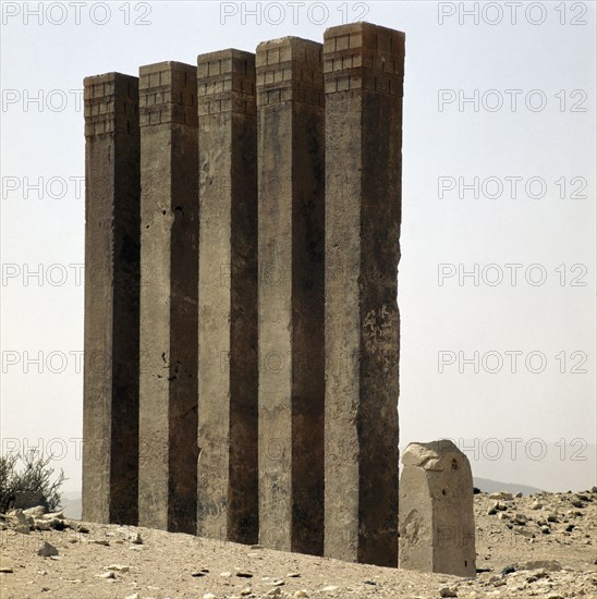 Five pillars still standing on the site of the Baran Temple, near the ancient city of Marib