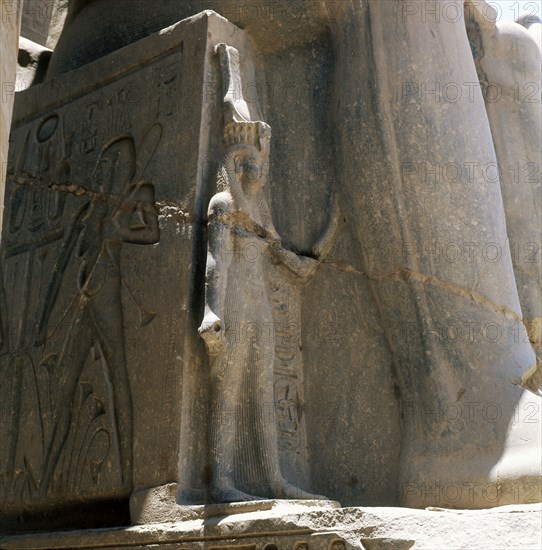 Base of a statue of Ramesses II in front of the temple at Luxor