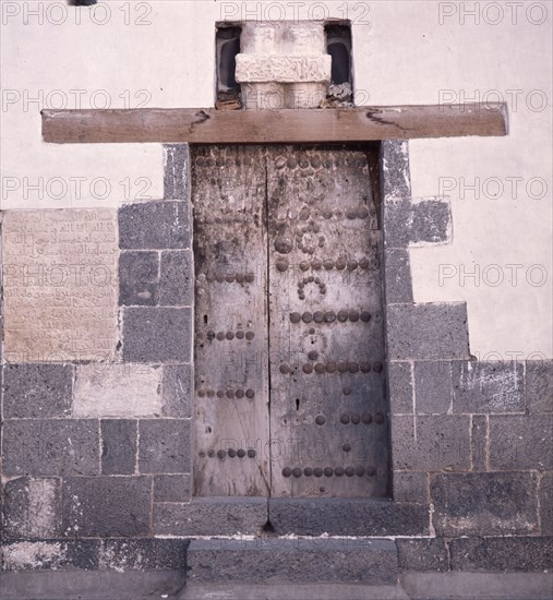 The doorway of an old multi-storeyed house in San'a