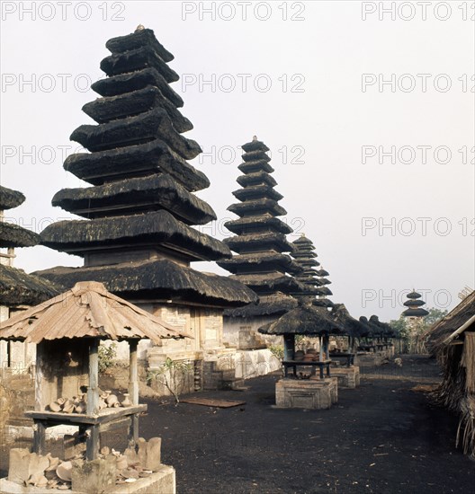 The water around the pagoda roofed shrines at the Pura Taman Ayun recalls the primeval ocean from which the cosmic mountain, symbolized by the shrines, formed the levels of the cosmos