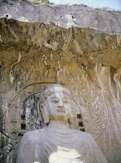 The colossal 17 metre high image of Vairocana Buddha in the Fengxian temple at the Longmen cave temples