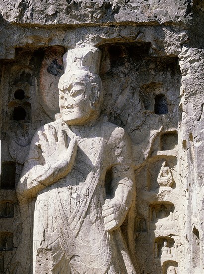 The Longmen cave-temple complex which extends for about 1000m along the Yi River