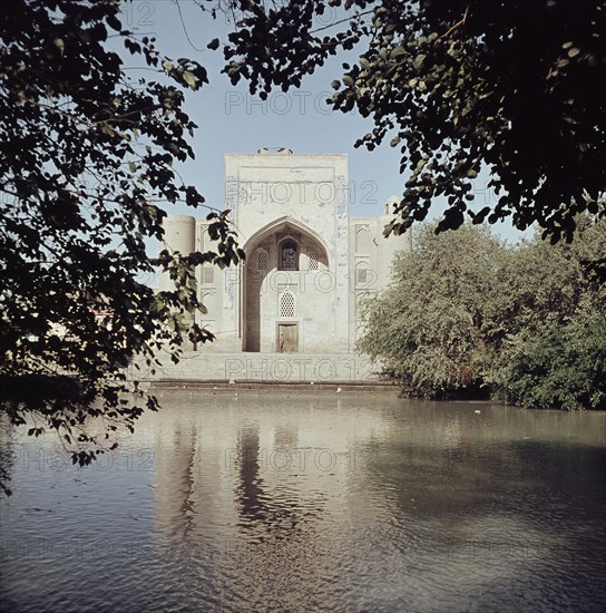 Madrasa in Bukhara, viewed across a lake