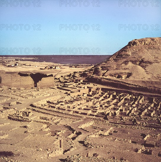 The village of Deir el-Medina is situated in the West Bank of the Nile opposite Luxor and was inhabited by the workmen who built the royal tombs between the reign of Thutmosis I and the late Ramessid period (c