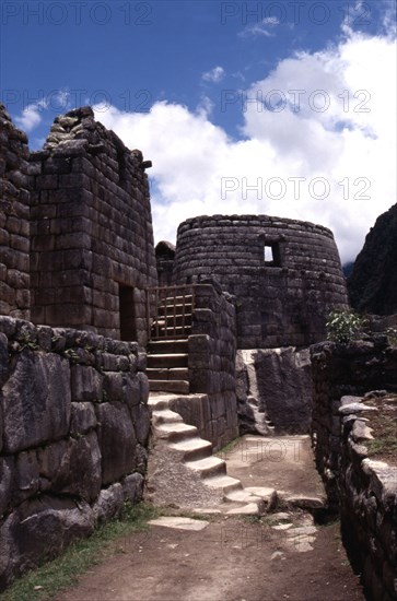 View of the Inca street leading to the circular "Torreon" or astronomical observatory