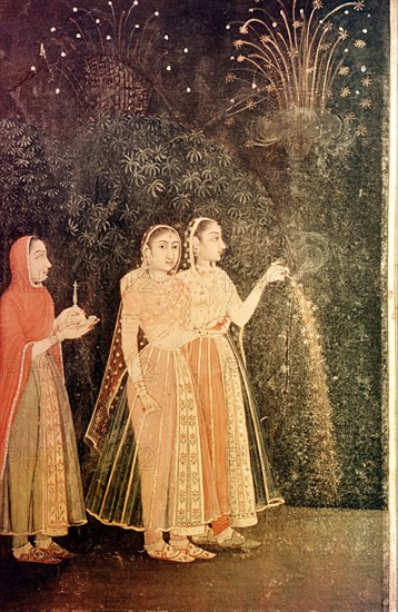 Three women with fireworks