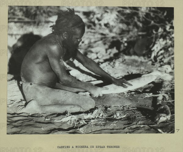 Carving a woomera