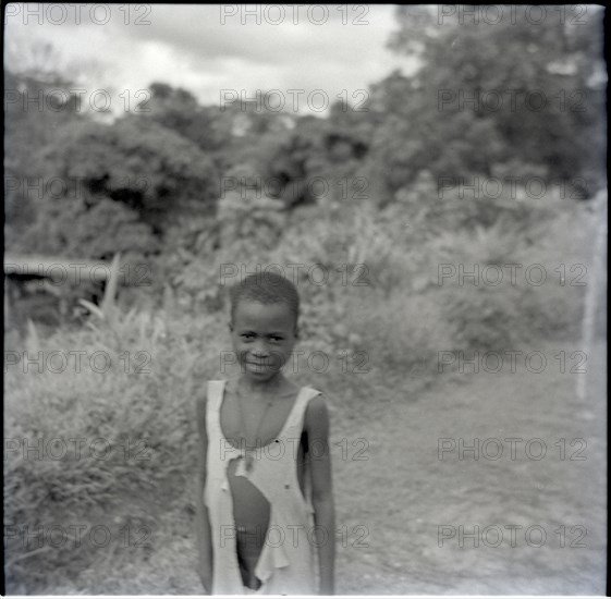 Abange's son, smiling