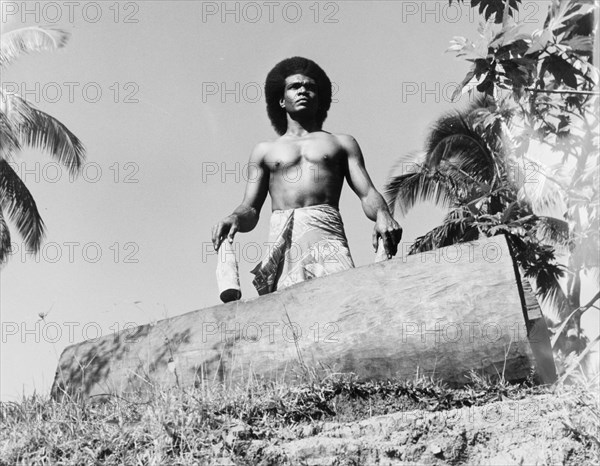 A Fijian drummer with a 'lali'