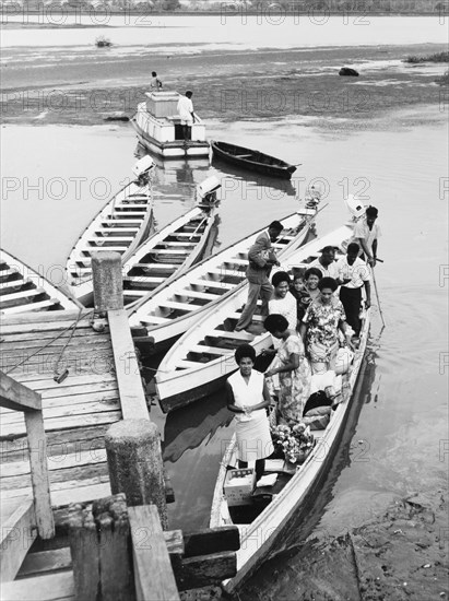 At a wooden jetty on the Nasilai River