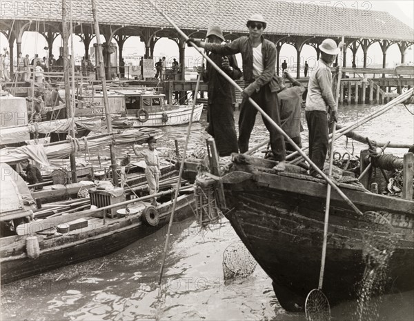 Fishing in a Hong Kong harbour