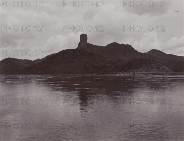 'Monk's Head Rock' across the Xijiang River