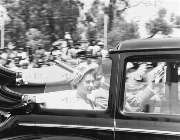 Princess Elizabeth is driven past onlookers