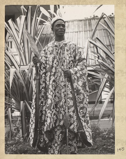 Posed shot of chief attending a meeting at Enugu