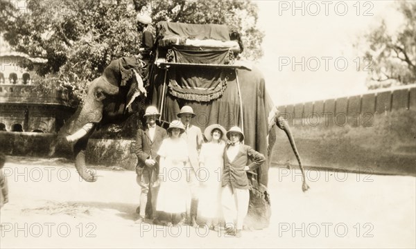 Europeans take an elephant ride