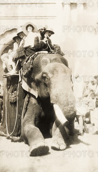 Europeans take an elephant ride