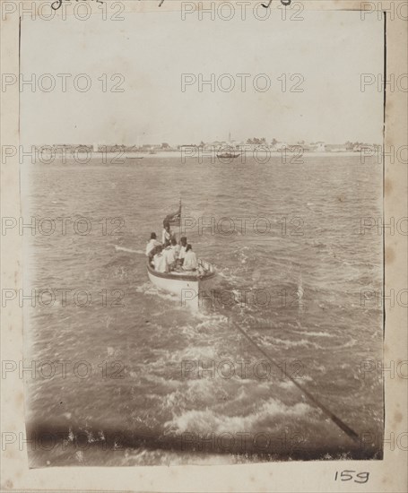 Crowded boat on tow rope