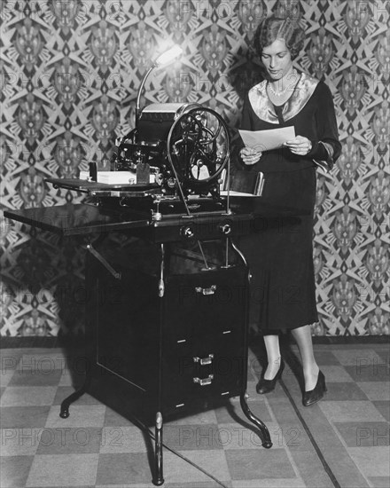 Woman Demonstrates Duplicator