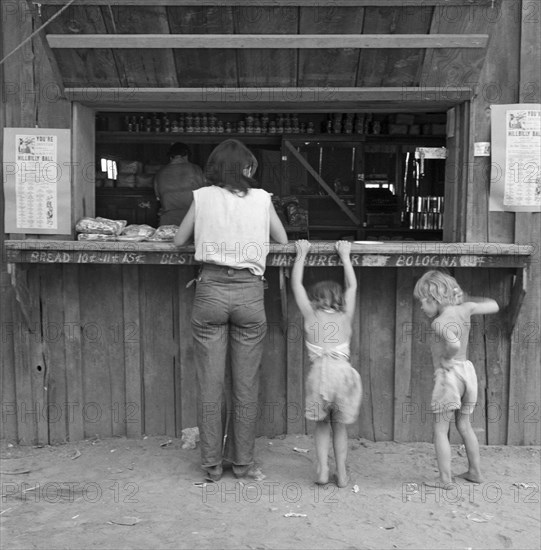 Farm Worker At Company Store