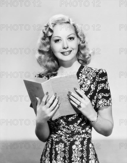 A Woman Reading A Book