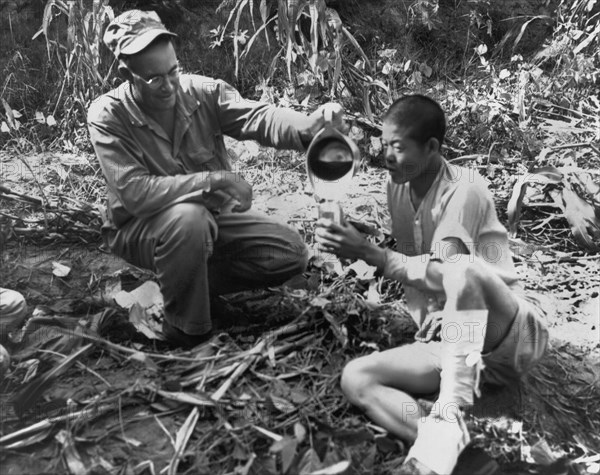 Navy Medic Assists POW