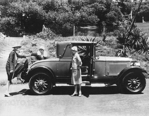 Climbing Into A Rumble Seat