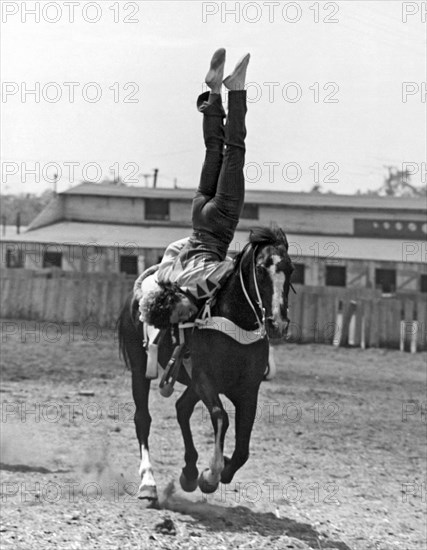 A Head Stand On Horseback