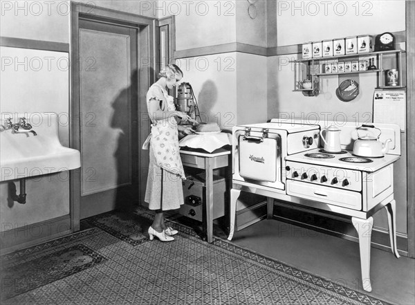 Woman Cutting A Homemade Cake