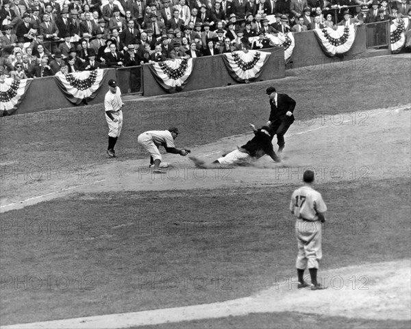 Spud Chandler is out at third in the second game of the 1941 Wor