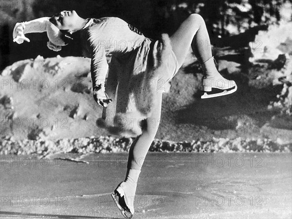 A Lovely Ballet Pose on Ice Skates