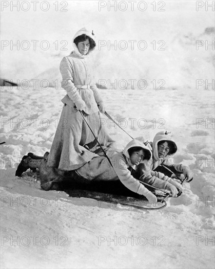 A Woman Rides On Two Friends