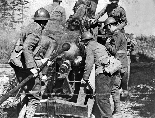 French soldiers fire their 155mm artlillery piece at German positions on the Western Front.