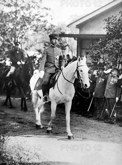 The Emperor of Japan, Hirohito, reviews the officers for Japanes