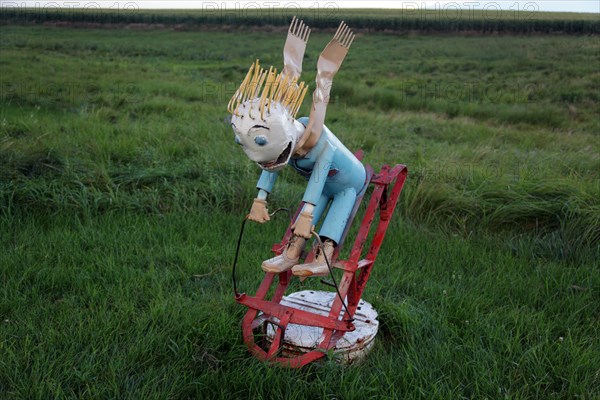 Porter Sculpture Park, Montrose, South Dakota; Child on Sled; Located just off Interstate 90 in the South Dakota Drift Prairie, about 25 miles west of Sioux Falls. Many of the sculptures, in the style of industrial art, were made with scrap metal, old farm equipment, or railroad tie plates. 2006