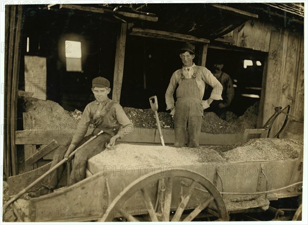 A Boy (may be over 14) at Heavy Work. Shoveling Ore at Daisy Bell Mine, Aurora, Mo. 1908