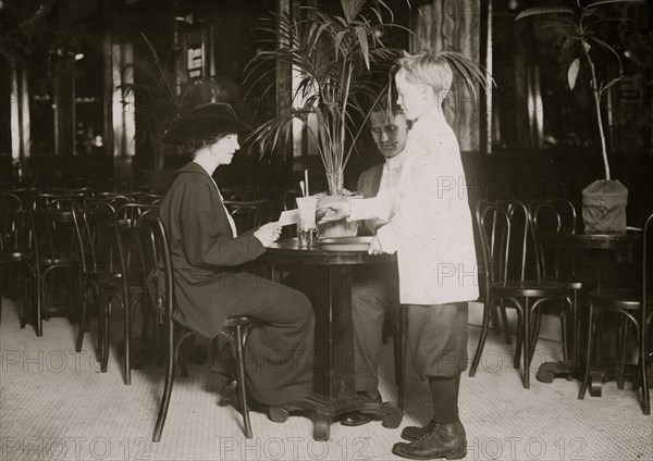 A young table boy in Newsome's ice cream parlor. Location: Birmingham, Alabama. 1914