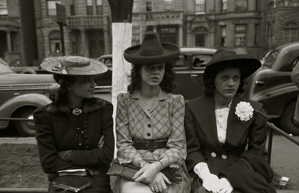 African American Girls waiting for Episcopal Church to end so they can see the processional, South Side of Chicago, Illinois 1938