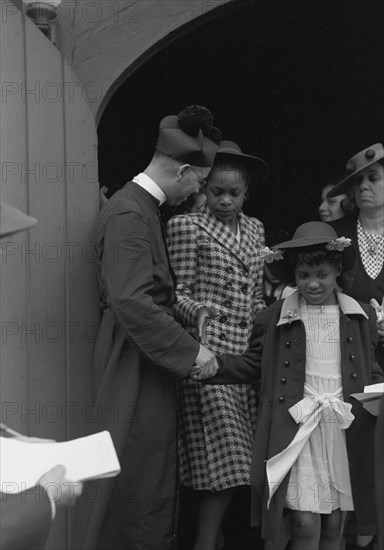 African American Shaking hands after church services, Chicago, Illinois 1938