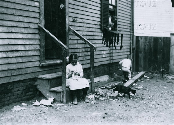 Annie Fedele, 22 Horace Street, Sommerville, Mass. This is one of the places she works on crochet. 1912