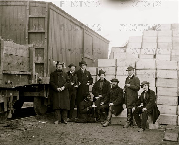 Aquia Creek Landing, Va. Clerks of the Commissary Depot by railroad car and packing cases 1863