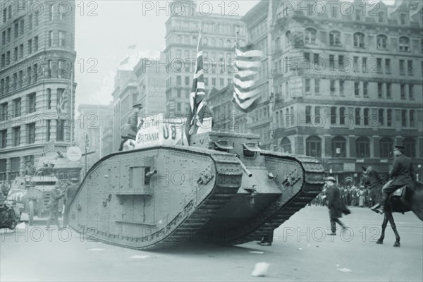 British tank sporting an American Flag tracks down Fifth Avenue, New York 1917