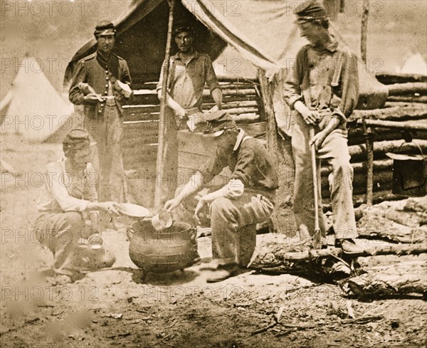 Camp of 71st New Vols. Cook house Soldiers getting dinner ready 1863